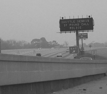 shuttle debris traffic sign