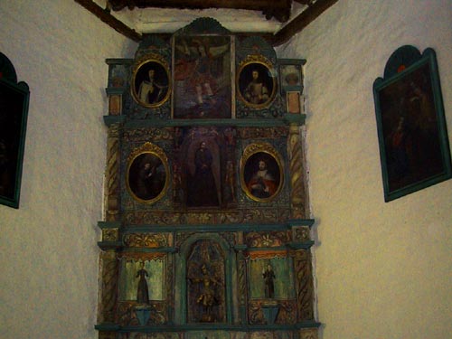 The altar inside the mission. The paintings are on buffalo hide.