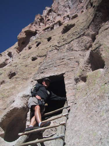 Ed climbs into a kiva. There were several rooms that visitors were allowed to go in.